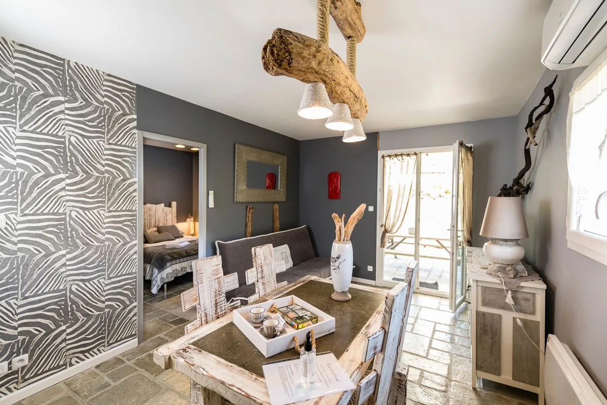 Salon et accès à la terrasse du Signature 33 m²